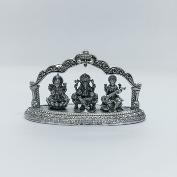 Pure silver idol of Ganesha with saraswati and lax... by 