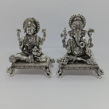 Pure silver idol of laxmi ganesha in antique polis... by 