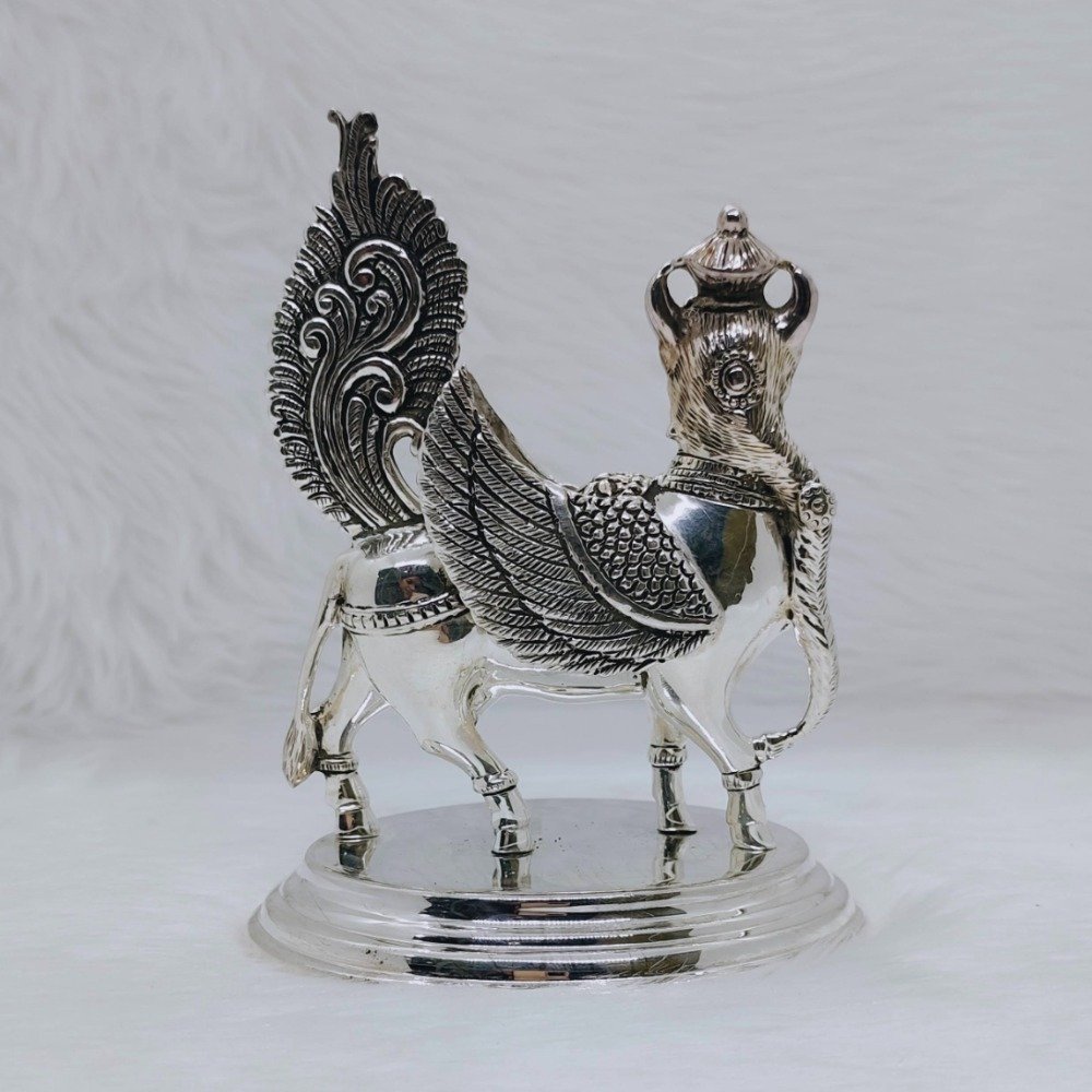 Pure silver kamdhenu cow idol in high antique fine work