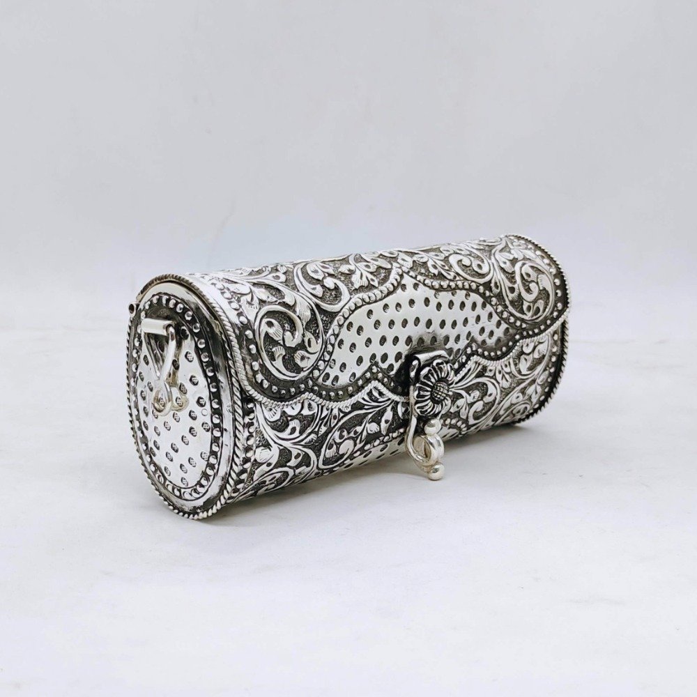 Real silver designer rounded shape clutch in finep carvings