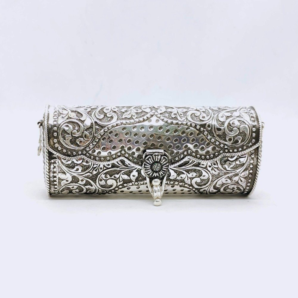 Real silver designer rounded shape clutch in finep carvings