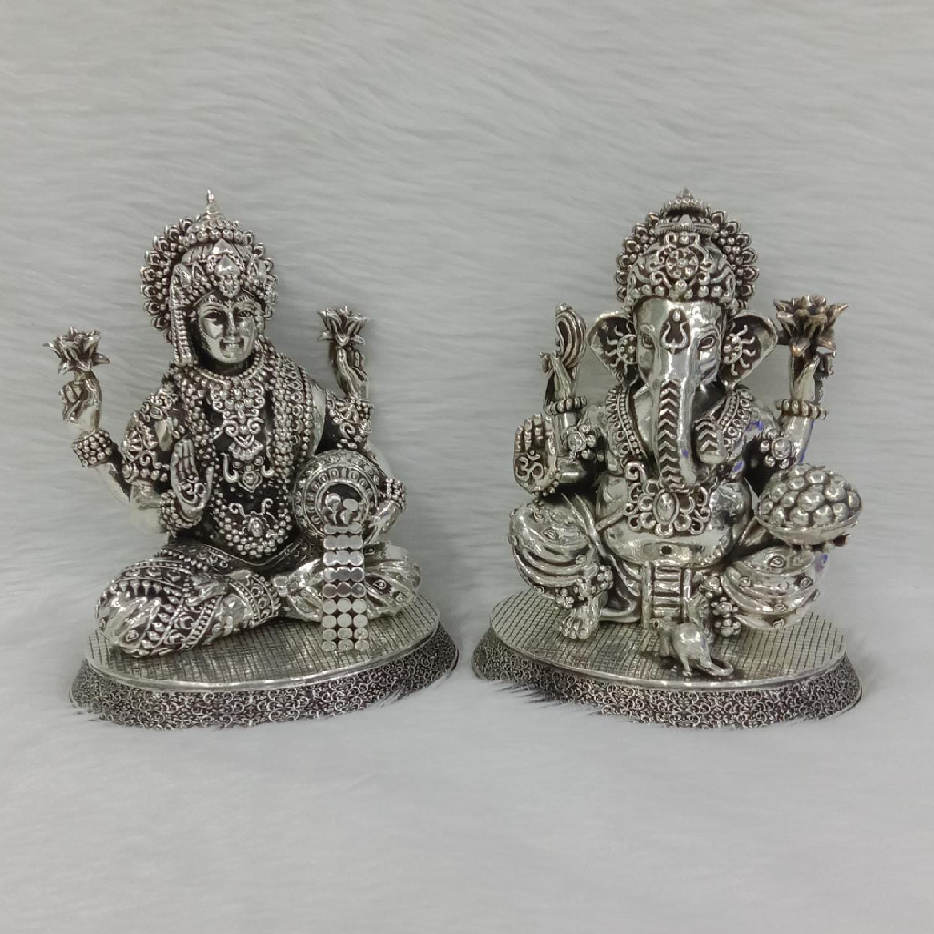 Pure silver idol of laxmi ganesha in antique polish