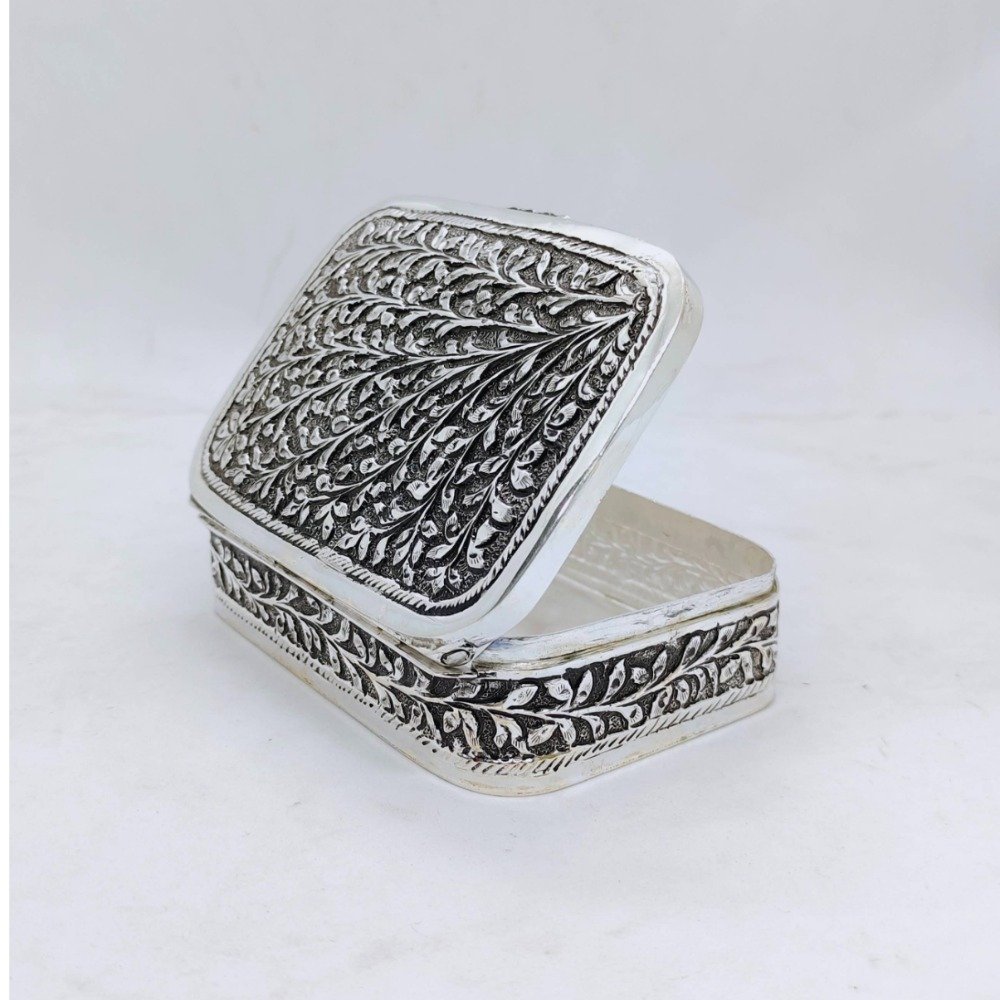 Pure silver box for gifting in antique leafs motifs carvings by puran