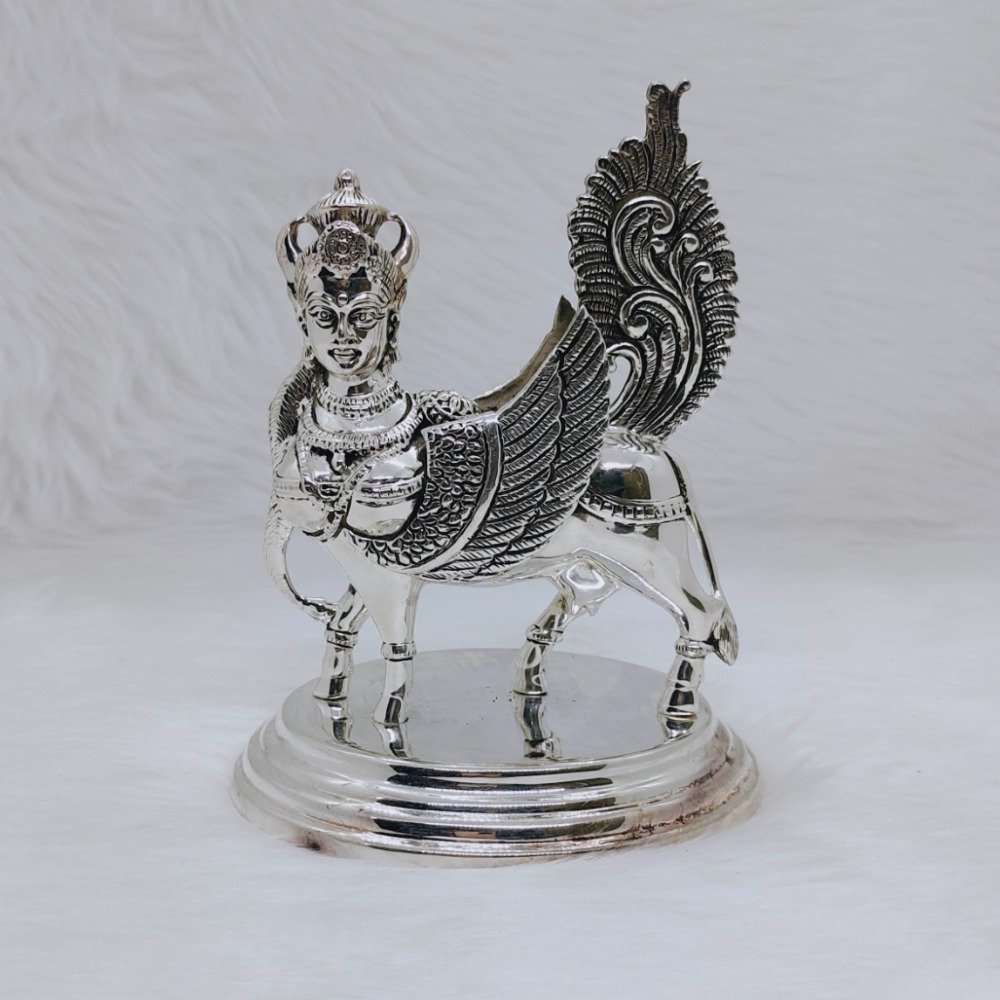 Pure silver kamdhenu cow idol in high antique fine work