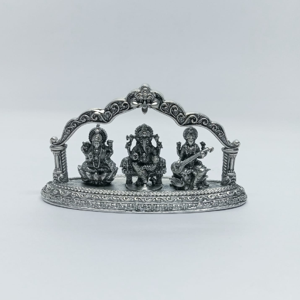 Pure silver idol of Ganesha with saraswati and laxmi ji