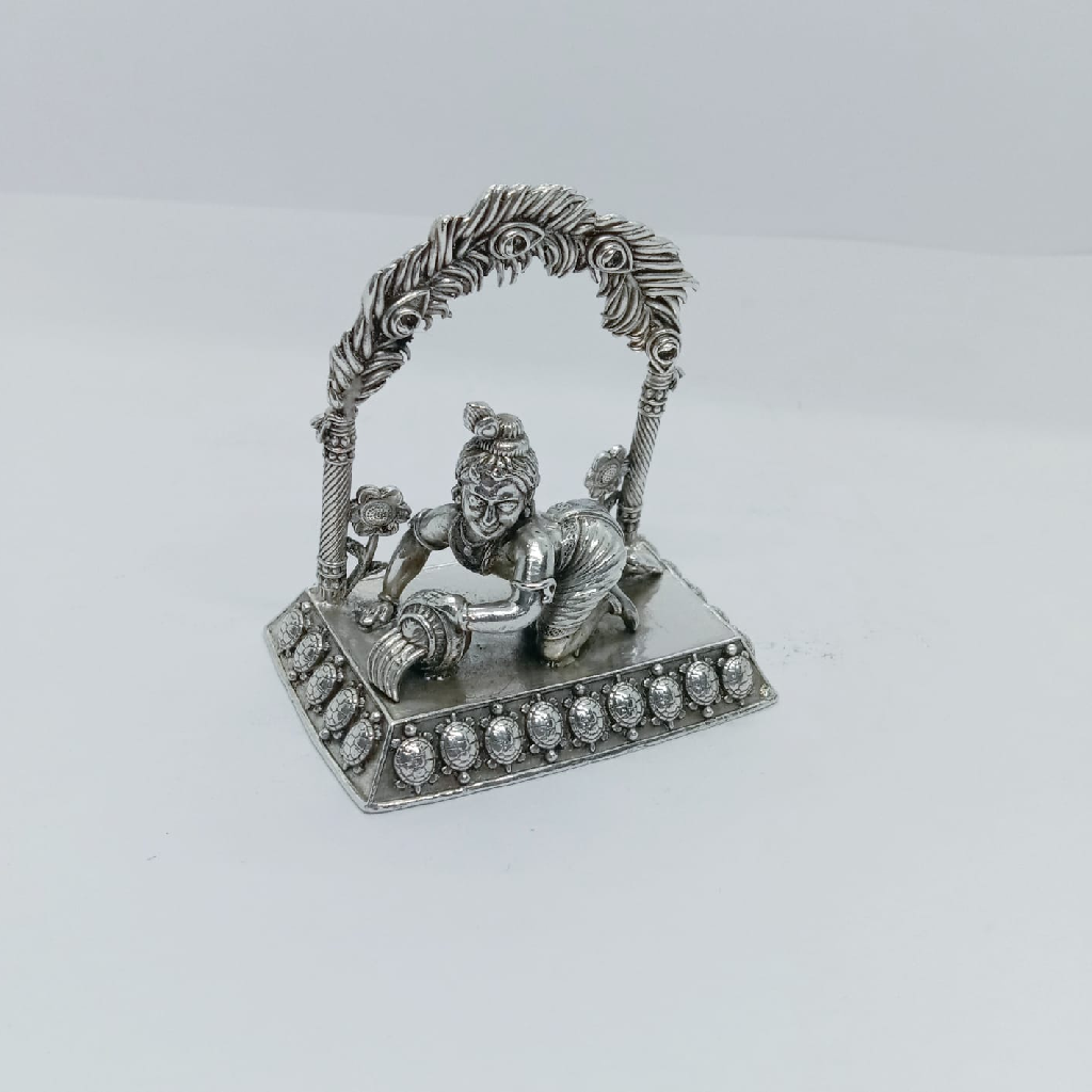 Pure silver idol of Ladoo Gopal in antique polish