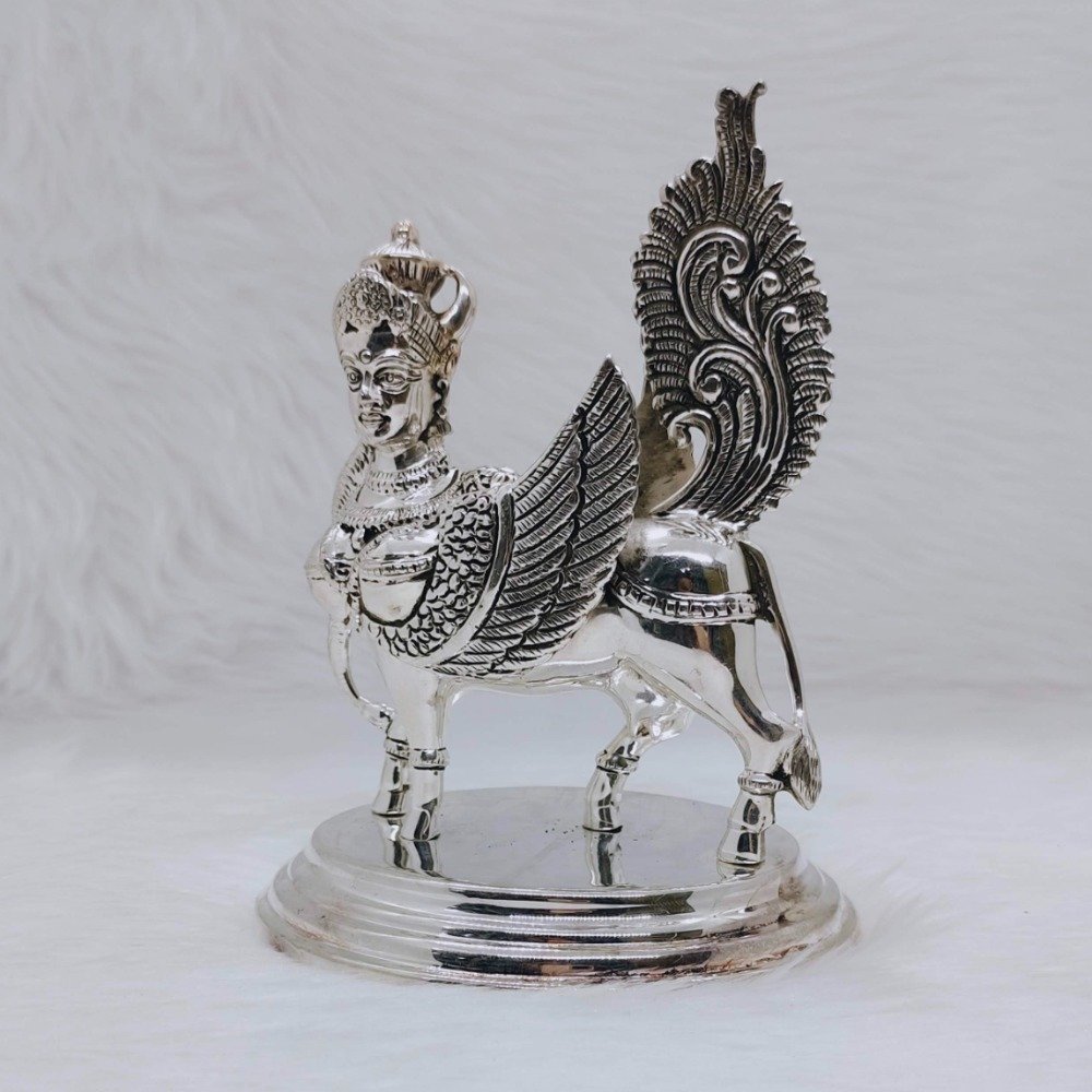 Pure silver kamdhenu cow idol in high antique fine work